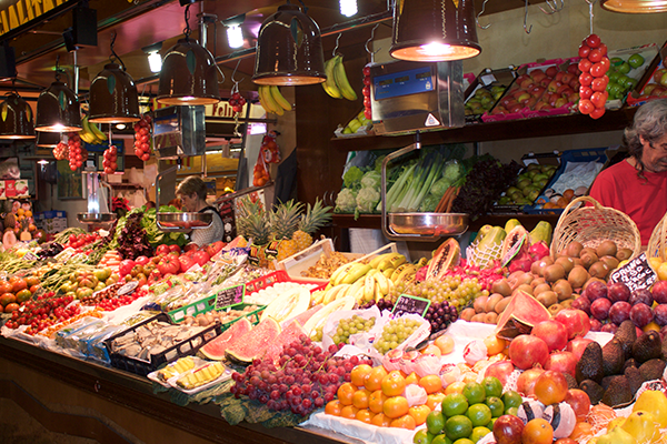 A market with many different fruits on display.